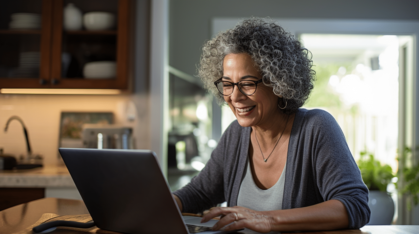 Hispanic woman in her 60s at home during a telemedicine appointment.