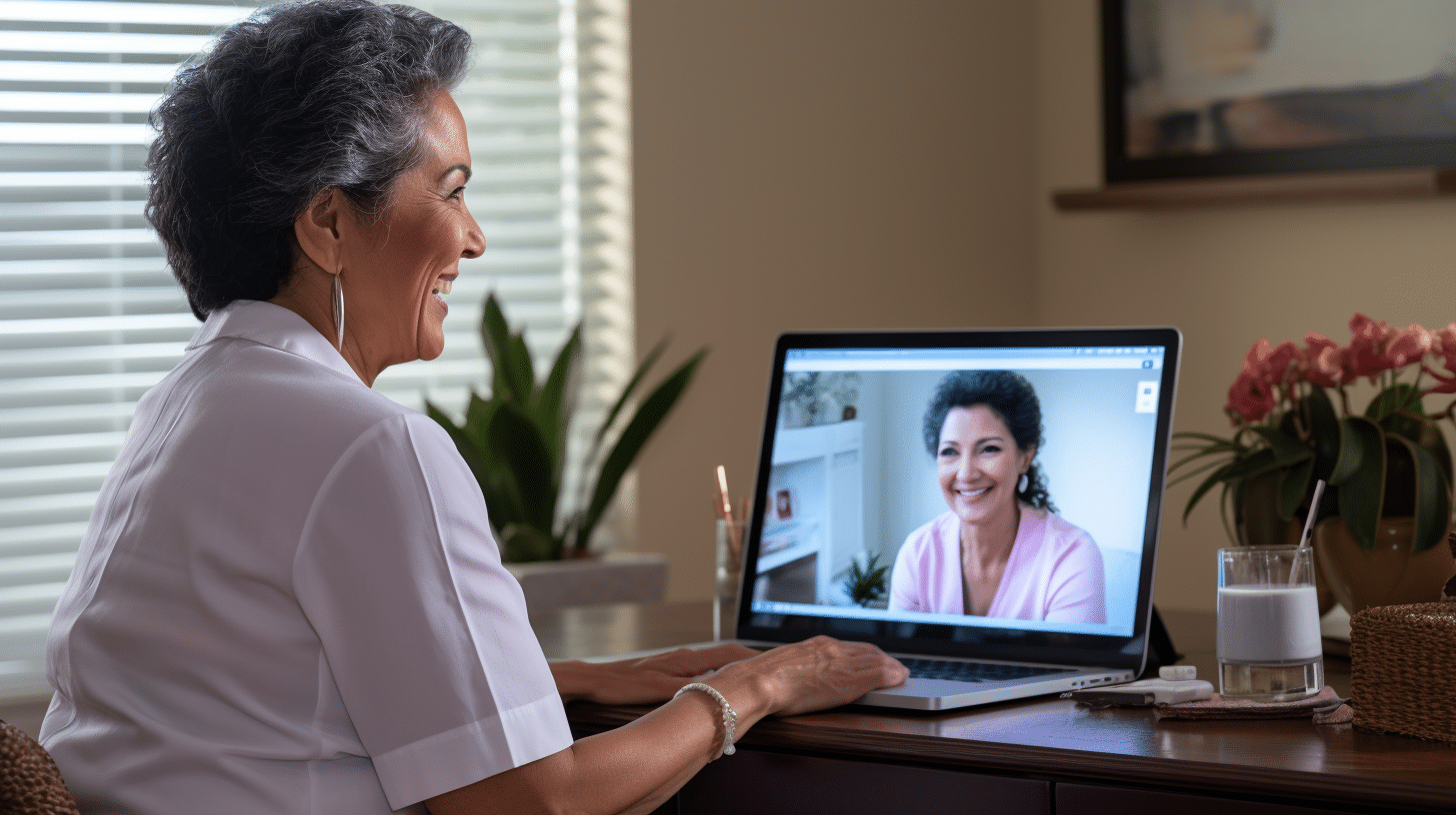 Hispanic woman in her 60s at home during a telemedicine appointment.