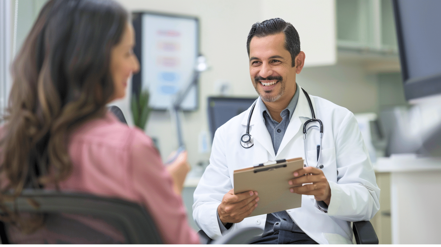 A smiling medical doctor explaining insurance policy of the clinic to a patient.