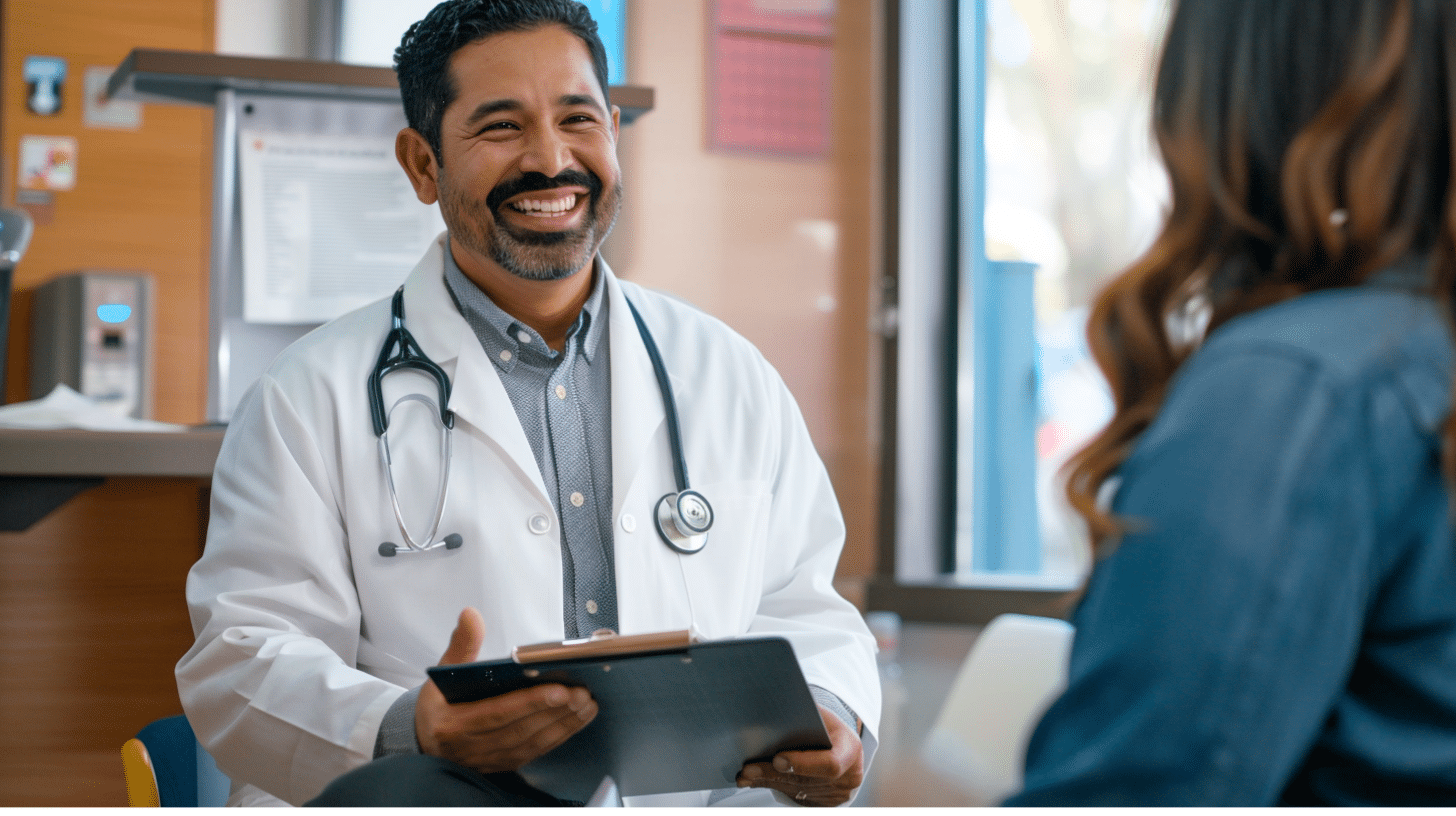 A smiling medical doctor talking to his patient about weight loss.